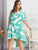 Plus Tassel Dip Hem Palm Tree Print Dress