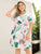 Plus Tropical Print Tassel Trim Belted Surplice Dress