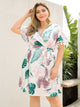 Plus Tropical Print Tassel Trim Belted Surplice Dress