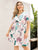 Plus Tropical Print Tassel Trim Belted Surplice Dress
