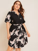 Plus Notch Neck Belted Curved Hem Crane Print Dress