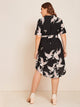 Plus Notch Neck Belted Curved Hem Crane Print Dress